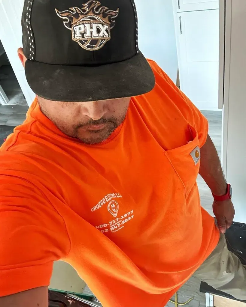 Orozco Electric electrician on a residential service call in the East Valley